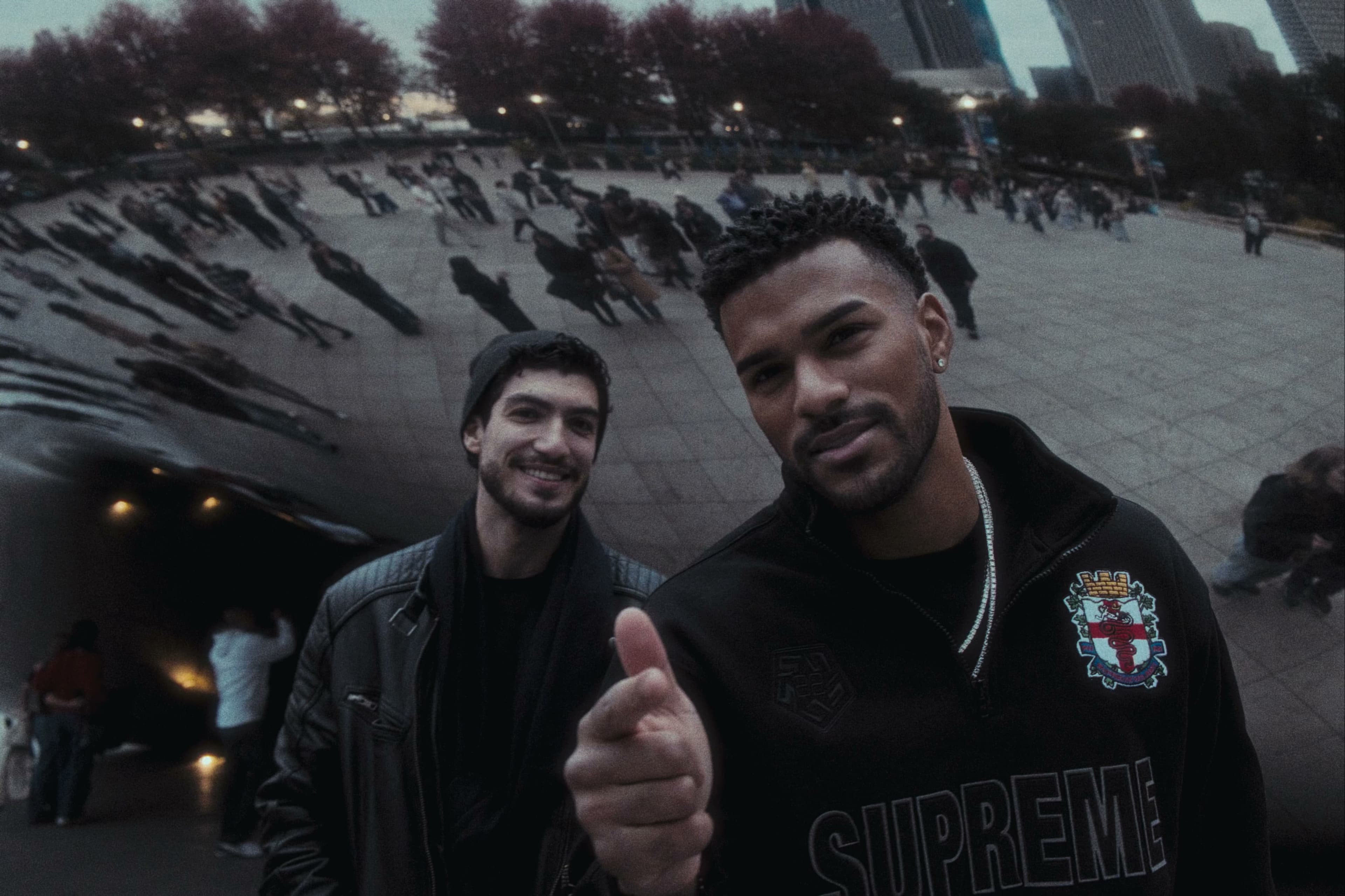 Jeremiah and Charlie posing in front of Cloud Gate (The Bean) at Millennium Park.