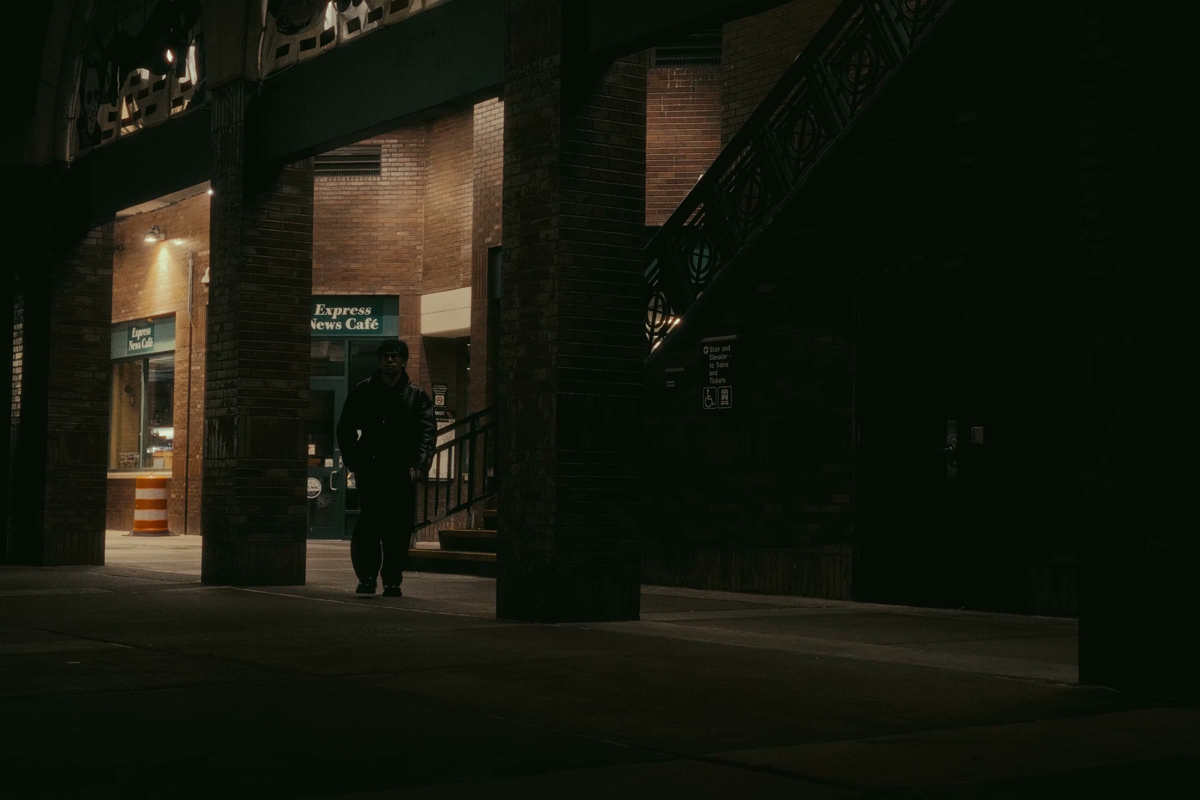 Andrew Amisola in Night at the Met — Andrew walking through Rahway Train Station at night.